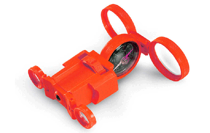 Orange plastic Optic wonder toy with lenses and compass.