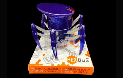 Hexbug micro robotic creature in purple plastic.